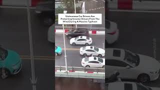 Vietnamese Car Drivers Are Protecting Scooter Drivers From The Wind During A Massive Typhoon [upl. by Josias691]