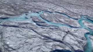 Rivers of meltwater on Greenland’s ice sheet contribute to rising sea levels [upl. by Halimak]