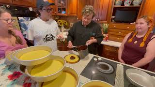 Mary Ada Marshall helps Nestor get Smith Island cake into oven on Maryland Crab Cake Tour Day 22 [upl. by Viafore]