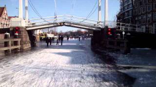 Schaatsen op het Spaarne door Haarlem  Ice skating on the river Spaarne Haarlem Holland 110212 [upl. by Enimajneb]