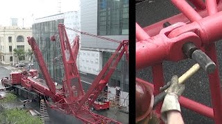 Assembling a large mobile crane that will be used to disassemble a tower crane [upl. by Elocn]