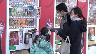 Le distributeur automatique  La haute technologie sur les trottoirs [upl. by Alig853]