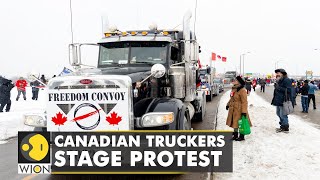 Canadian truck drivers stage protest against Covid19 vaccine mandate  World English News  WION [upl. by Aikel]