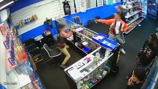 VIDEO Gun battle breaks out between store employee and wouldbe robbers [upl. by Vickie]