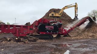 Rotochopper B66L grinding a mixed pile of logs and tree care waste [upl. by Chesna]