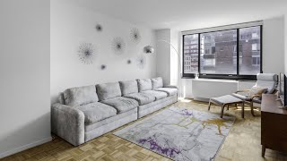 TOURING a FANTASTIC 2BEDROOM APARTMENT in DOWNTOWN NYC  200 Rector Pl 7E  SERHANT Tour [upl. by Greyso34]