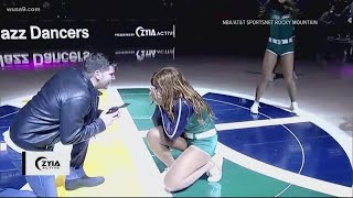 Jazz cheerleader surprised with a wedding proposal during routine  Get Uplifted [upl. by Gessner]