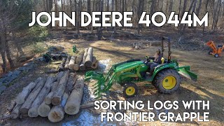 John Deere 4044M using Frontier AV20H grapple [upl. by Wendi]