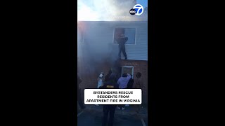 Bystanders rescue residents from burning apartment building [upl. by Siri]