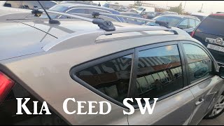 Roof rack bars with railing for KIA CEED SW [upl. by Kilmarx]