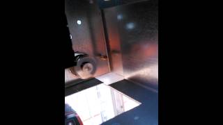 Enlarging a hole in metal with hole cutters [upl. by Allrud]