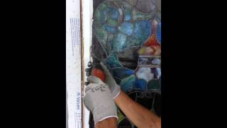 Removing old glazing with Fein knife [upl. by Bobker]