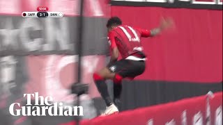 Goal celebration goes wrong as JLeague striker misjudges drop behind advertising board [upl. by Bernhard95]