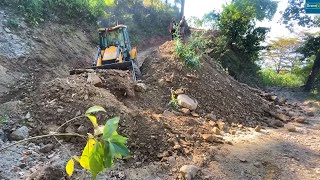 Massive Dirt Piled Up on Mountain RoadClearing with JCB Backhoe [upl. by Enilekcaj]