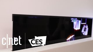 LG Display makes a 65inch TV that actually rolls up [upl. by Ahsenhoj606]