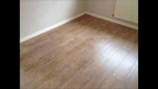 Laminate Flooring by Perfection Flooring Kolberg Oak 12mm Laminate Flooring Installation [upl. by Drawd]