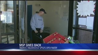 Police trainees volunteer to unload food to food pantry [upl. by Llenor]