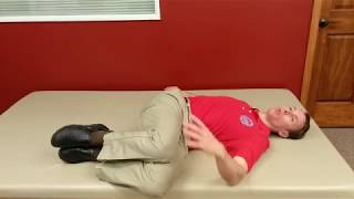 The Million Dollar Exercise for Low Back Pain amp Sciatica  Rotation in Flexion [upl. by Gabie375]