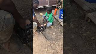 Why we went off grid Father teaching his son how to replace a chain on a chain saw [upl. by Akiria]