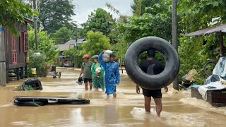 Myanmar residents flee severe floods shelter in a school  AFP [upl. by Analram]