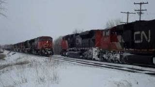 Canadian National Railway trains meet on a cold winter day [upl. by Aileahcim]