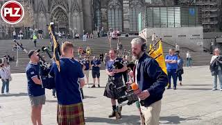 🎥I Bagpipers bring some Scottish culture to Cologne [upl. by Eilraep148]