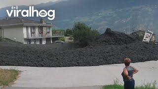 Massive Mudslide in Switzerland  ViralHog [upl. by Ellezig]