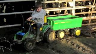 Kids playing on tractors in the mud amp john deere gators children on the farm TRACTOR SONG [upl. by Balough]