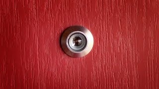 How to install a door viewer peep hole [upl. by Enelear]