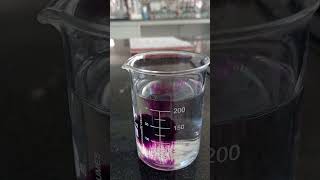 Diffusion of potassium permanganate crystals in water  Chemistrydemo [upl. by Armanda]