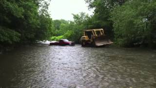 Cat D7 dozer rescues Dodge stuck in rising river [upl. by Sofko903]