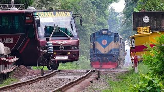 Train passing through a busy Rail Crossing Gate Benapole Commuter of Bangladesh Railway [upl. by Atilrak]