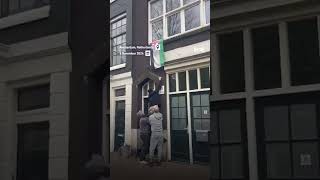 Maccabi Tel Aviv hooligans tear down Palestinian flags from homes in Amsterdam [upl. by Aicilyhp]