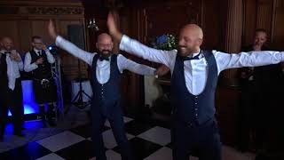 Epic Grooms surprise first dance to Tina Turner’s Proud Mary [upl. by Naimerej279]