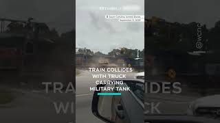 Train collides with truck carrying a military tank in the US [upl. by Aniela]