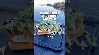 CAESAR FRIED CHICKEN SANDWICH BY THE WATER ❤️‍🔥🍗🌊 friedchicken food cooking outdoorcooking [upl. by Teri279]