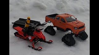 Rc ADVENTURE RC SNOWMOBILE POLARIS RMK AND TRX4 TRAXX BRUSHLESS TOYOTA 4X4 [upl. by Ottavia]