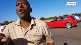 WATCH Gauteng cop shoves motorist during roadside altercation [upl. by Newkirk]