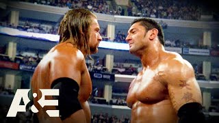 Batista BETRAYS Triple H Leading to EPIC Rivalry  WWE Rivals  AampE [upl. by Attelrahs]