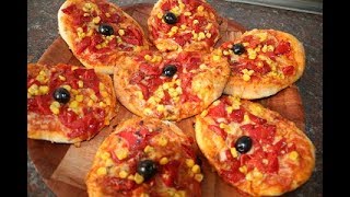 Des mini pizzasميني بيتزا ناجحة بطريقة مبسطة مع مطبخ قمرMatbakh kamar [upl. by Minsat]