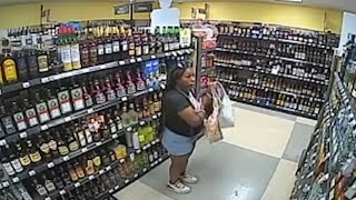 Surveillance video shows Ta’Kiya shoplifting bottles of alcohol before being fatally shot by police [upl. by Gratianna]