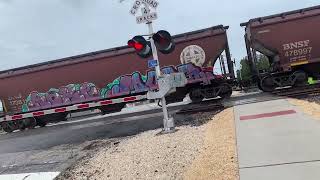 Northbound BNSF grain train at 3rd street in Rosenberg Texas on 72624 [upl. by Ilrebmyk946]