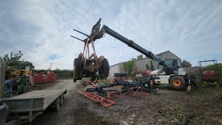 bobcat 360° telehandler lifting massey ferguson T20 with banana loader [upl. by Ardnahc]