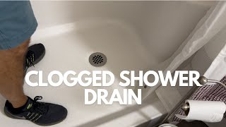 Unclog Your Shower Drain  2 Minute Fix [upl. by Stralka]