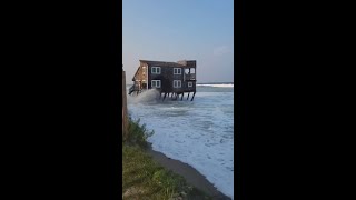 Beachfront home collapses into ocean [upl. by Mclaughlin328]