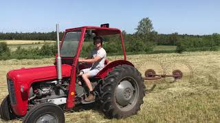 Raking hay with Vicon Acrobat and Massey Ferguson 35 [upl. by Kered]