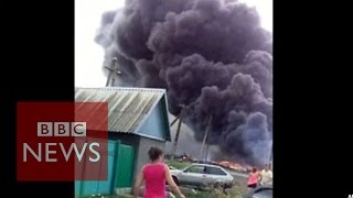 MH17 New footage shows crash aftermath  BBC [upl. by Airdnola]