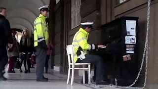 Yiruma  River Flows In You  street piano Prague  song performed by Czech police [upl. by Elinnet]