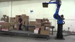 Motoman robot depalletising randomly positioned boxes [upl. by Orsini677]