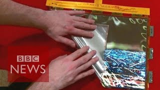 CES 2016 LGs bendy rollup OLED screen  BBC News [upl. by Eentruoc]